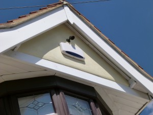 bullet style IR camera mounted on a house