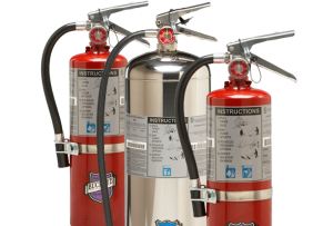 Picture of 2 red fire extinguishers and 1 stainless steel fire extinguisher between them