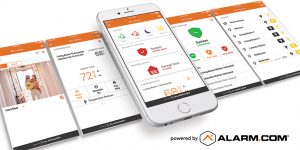 Several smart phones with Alarm.com apps open, showing security system and smart home controls