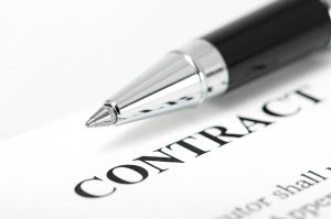 A contract and pen