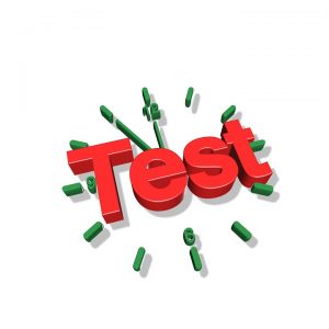 The word "Test" imposed over the image of a clock.