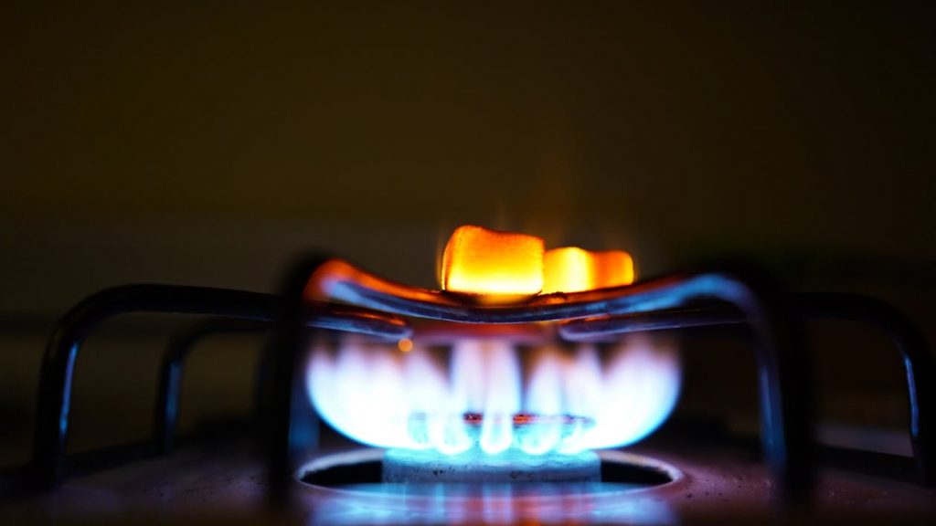 A gas burner on a stove