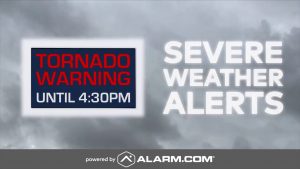 An Alarm.com severe weather alert reading "Tornado Warning Until 6:30 PM"