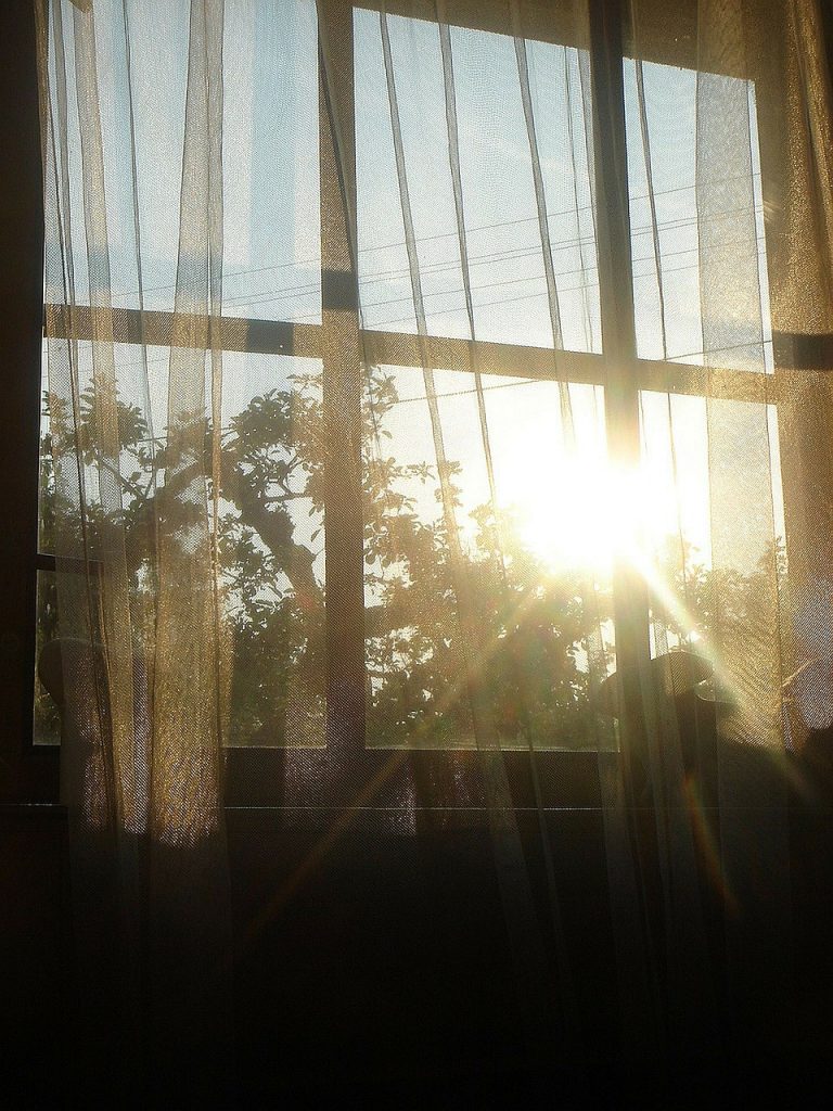The sun shining through a window
