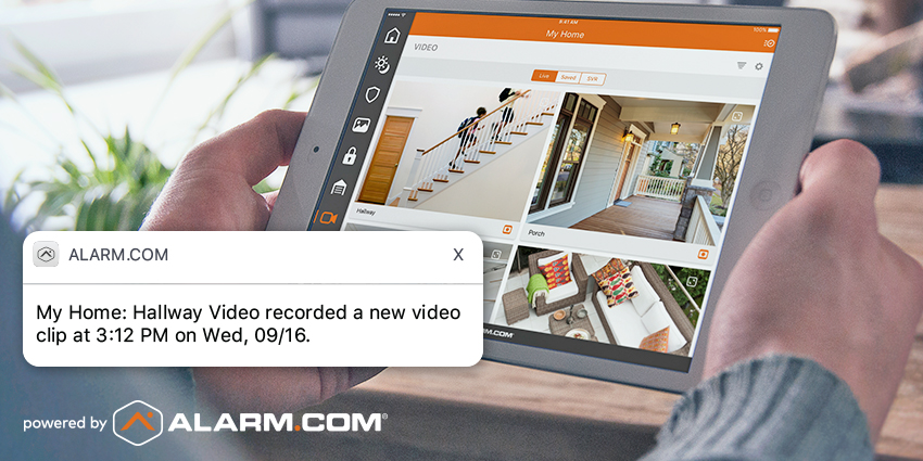 An Alarm.com camera capturing kids walking up a staircase