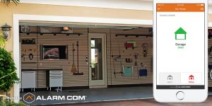 An open garage with an Alarm.com cell phone display indicating that the garage has been left open