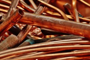 A pile of copper pipe