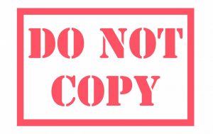 A sign reading "DO NOT COPY"
