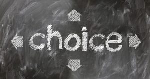 A chalkboard with the word "Choice" and 4 arrows